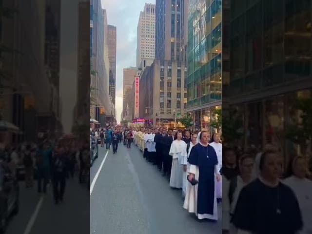 More than 5,000 Catholics walked down the streets of New York City praying and singing for peace.